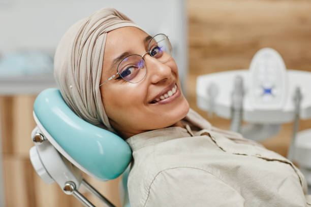 Middle Eastern Woman in Dentists Chair stock photo