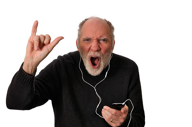 Middle-age Man Rocking to Music stock photo