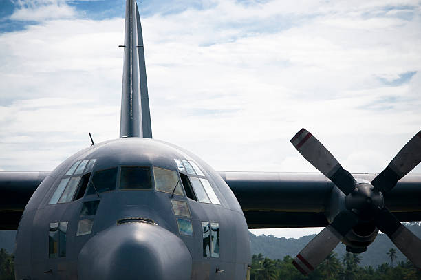 Mighty Hercules Front view of a Hercules C130. military airplane stock pictures, royalty-free photos & images
