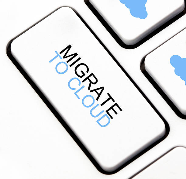 Migrate to cloud button Migrate to cloud button on keyboard animal migration photos stock pictures, royalty-free photos & images