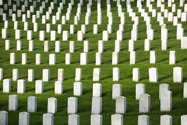 military cemetery headstones mark dead veterans graves Military headstones at Jefferson Barracks National Cemetery in Missouri mark the graves of American veteran soldiers who served in the Army, Navy, Marines and Air Force. memorial day background stock pictures, royalty-free photos & images