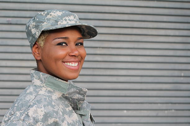 Military female smiling with copy space Military female smiling with copy space. military lifestyle stock pictures, royalty-free photos & images