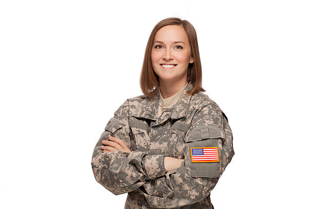 Military female with her arms crossed A smiling soldier in camouflage clothing air force stock pictures, royalty-free photos & images