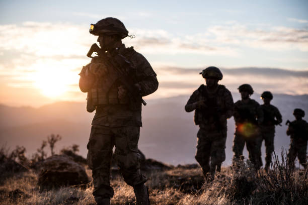 Military Mission at sunrise Military Mission at sunrise infantry stock pictures, royalty-free photos & images