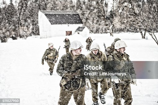 istock WWII US Military Squadron On Patrol In A Winter Blizzard 511027950