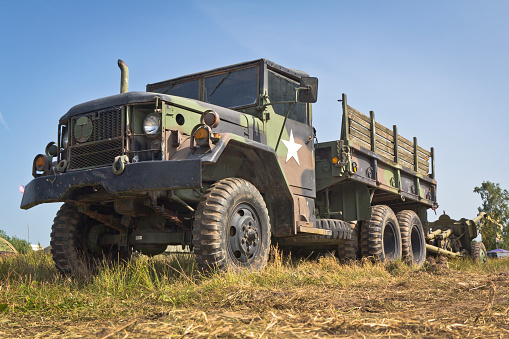 US Military M-923 A1 Truck, Cargo, 5-ton, 6x6 with a cannon on the military proving ground