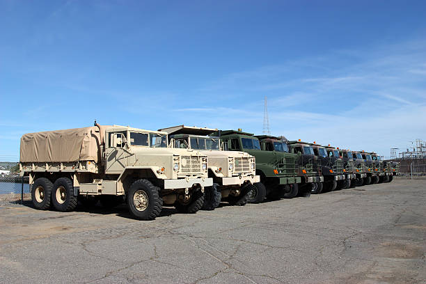 Military Vehicles Row of military vehicles military land vehicle stock pictures, royalty-free photos & images
