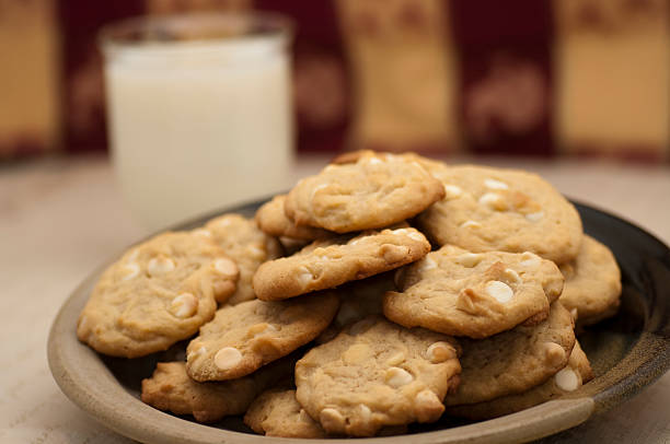 Milk and Cookies Arranged on a Plate stock photo