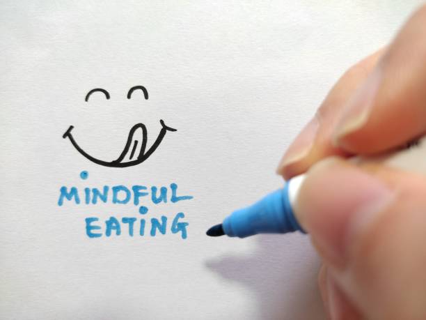 Mindful eating concept. Mindfulness lifestyle. Tips for mindful eating, notice, observe, feel, taste and enjoy food stock photo