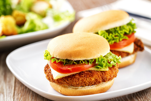 Mini Chicken Burger With Caesar Salad Stock Photo - Download Image Now ...