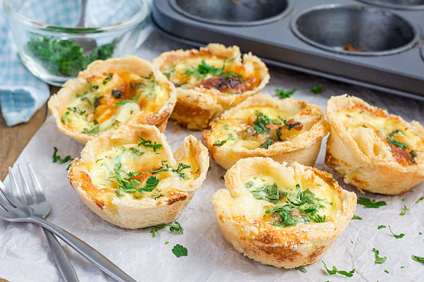 Mini quiche with bacon Mini quiche with bacon meat pie stock pictures, royalty-free photos & images