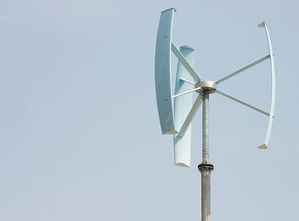 Mini wind power Mini wind power for domestic use vertical axis wind turbine stock pictures, royalty-free photos & images