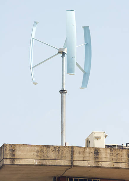 Mini wind power Mini wind power for domestic use vertical axis wind turbine stock pictures, royalty-free photos & images