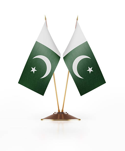 Miniature Flag of Pakistan Miniature Flag of Pakistan. The flags have nicely detailed fabric texture. Isolated on white background. Clipping path is included. pakistan flag stock pictures, royalty-free photos & images