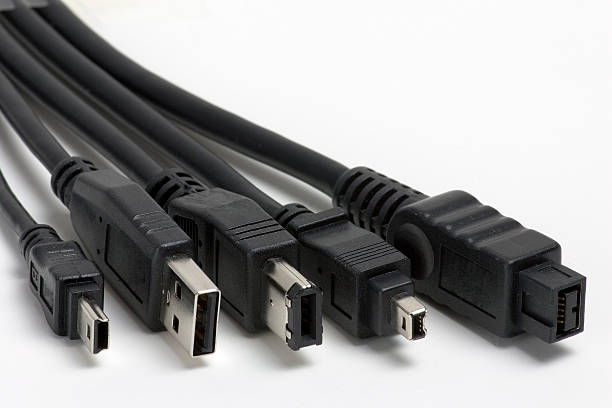 MiniUSB, USB, FireWire 6, 4 and 9-pin plugs stock photo