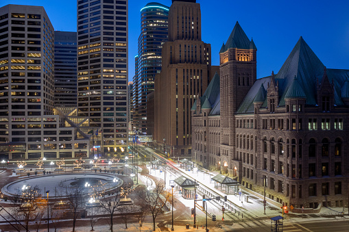 A High Angle Long Exposure Shot of the Minneapolis City Hall and Lightrail Train Station during a Winter Twilight