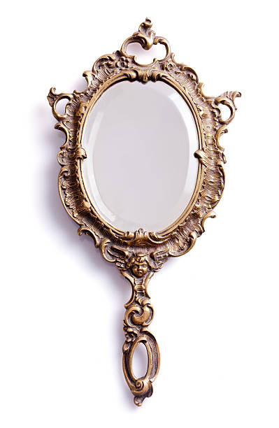 Mirror with golden handle and frame Beautiful vintage isolated hand mirror. mirror object stock pictures, royalty-free photos & images