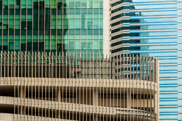 Mirrored walls of big skyscrapers Abstract city background. stock photo