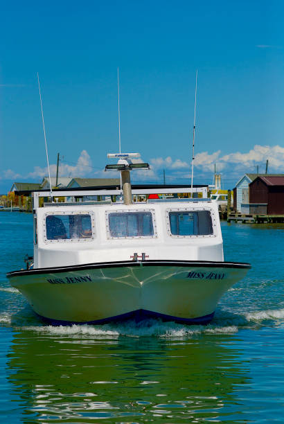 "Miss Jenny" Crab Boat, Tangier Island, Virginia Tangier Island, Virginia / USA - June 21, 2020: The “Miss Jenny” is one of many boats used by local watermen in this popular tourist destination in the Chesapeake Bay. tangier island stock pictures, royalty-free photos & images