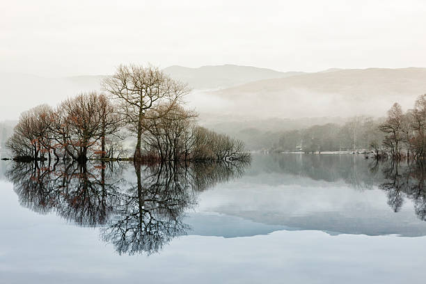 Misty Dawn at Balmaha A thin dawn mist over Loch Lomond.  Viewed from Balmaha on the east shore of the loch. theasis stock pictures, royalty-free photos & images