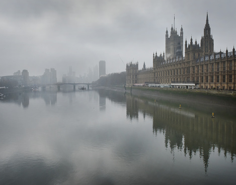 London looking Monet ish in the mist.\nRiver Thames with London skyline from Westminster Bridge