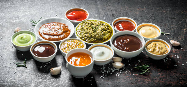 Mix from different kinds of sauces. Mix from different kinds of sauces. On dark rustic background sauce stock pictures, royalty-free photos & images