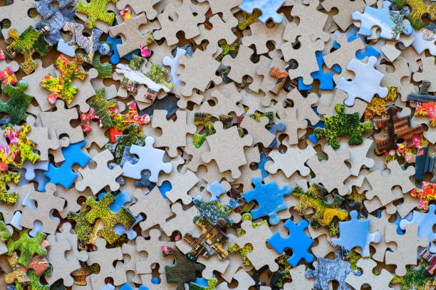 Mixed colour puzzle pieces. Mixed colour puzzle pieces. Backgrounds. puzzle stock pictures, royalty-free photos & images