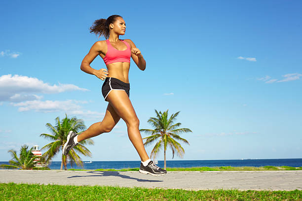 Mixed Race Woman Jogging stock photo