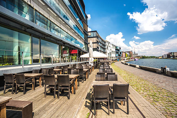 Münster harbor with restaurant (North Rhine-Westphalia) Münster harbor with restaurant (North Rhine Westphalia) munster france stock pictures, royalty-free photos & images