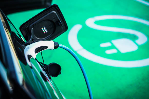 E Mobility Electric car is charged at the charging station electric vehicle charging station photos stock pictures, royalty-free photos & images