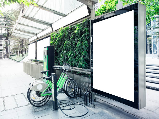 Mock up Billboard at Bus Station with Public Bicycle parking stock photo