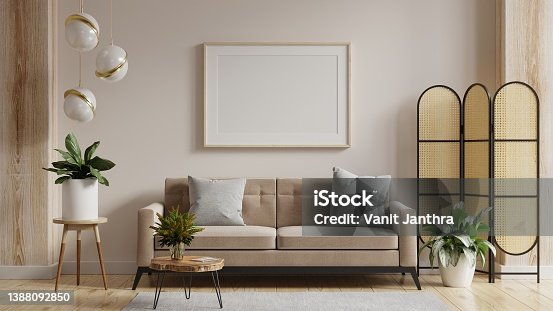 istock Mock up poster frame in modern interior background with sofa and accessories in the room. 1388092850
