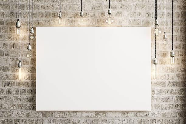 mock up poster with ceiling lamps and a rustic brick - canvas stockfoto's en -beelden
