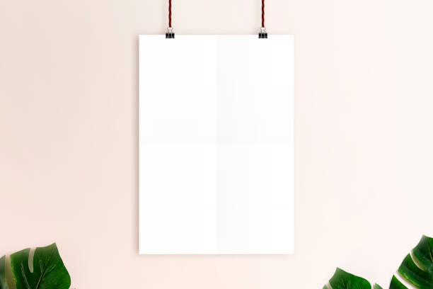 Mockup white poster on rusty pink wall background. Mockup white poster on rusty pink wall background. boutique photos stock pictures, royalty-free photos & images
