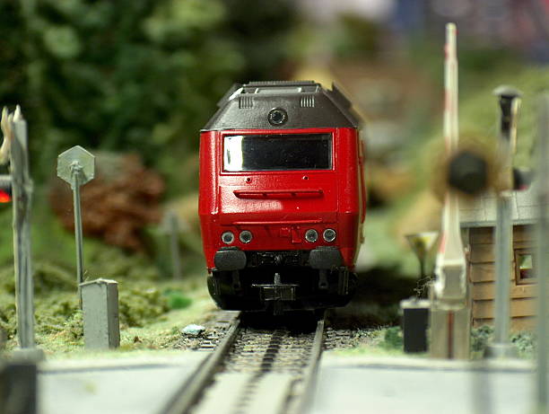 Model diesel Locomotive scale H0 passing crossing stock photo