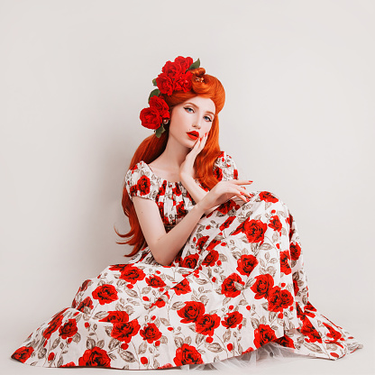 Model In Rose Flower Dress Beautiful Stylish Outfit Long Red Hair Redhead  Model With Flower Hairstyle On White Background Girl In Bright Outfit  Beauty Redhead Woman With Rose Flowers In Hair Stock