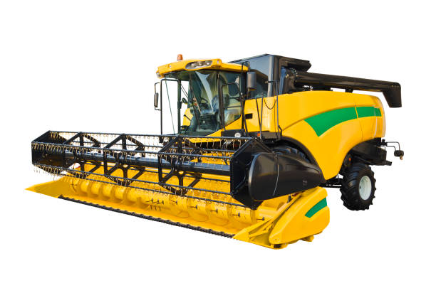 Modern agricultural combine, front view Modern agricultural combine isolated on a white background agricultural equipment stock pictures, royalty-free photos & images
