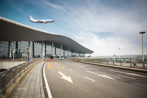 modern airport outside , airplane with road background