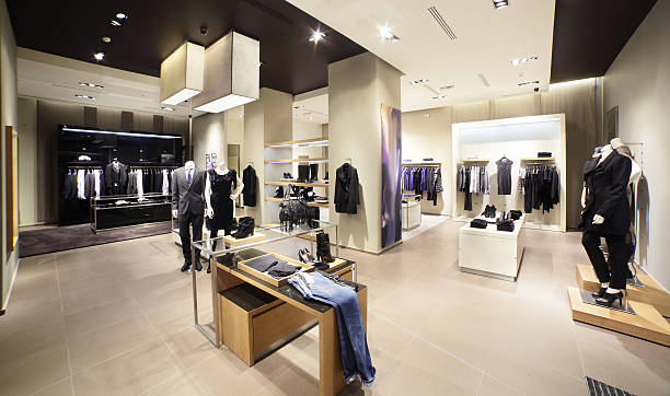 modern and fashion clothes store interior of brand new fashion clothes store boutique stock pictures, royalty-free photos & images