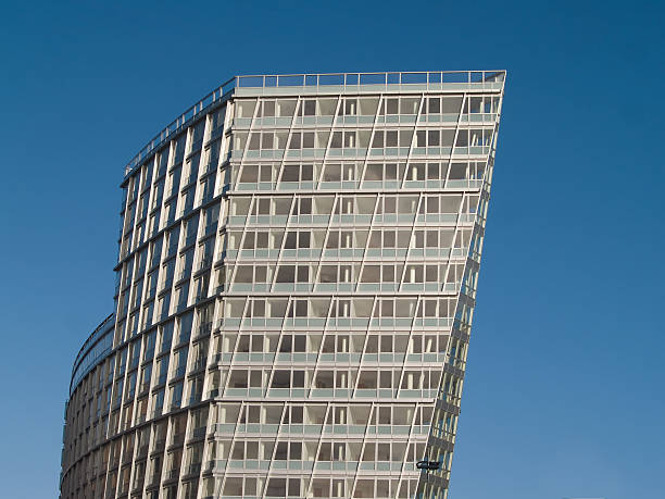 Modern angular office and apartment building on Liverpool's waterfront. stock photo