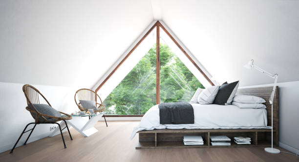 modern attic bedroom interior. stock photo