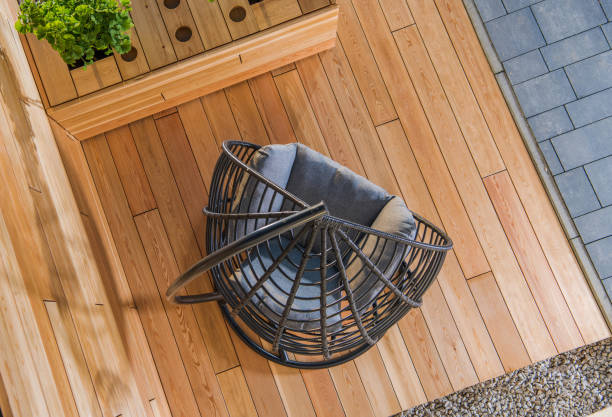 Modern Backyard Garden Wooden Deck with Hanging Garden Chair Modern Backyard Garden Wooden Deck, Table and Hanging Comfortable Garden Chair. Top View. Brick and Rocks. deck photos stock pictures, royalty-free photos & images
