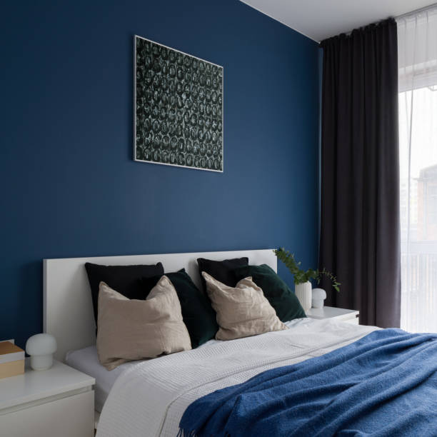Modern bedroom in white and blue stock photo