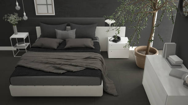 Moderno dormitorio con ventana, pecho del cajón y gran olivo, paredes de concreto, diseño interior minimalista - foto de stock