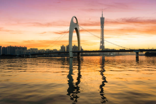 Modern bridge in Zhujiang river and modern building of financial district in Guangzhou city, China stock photo