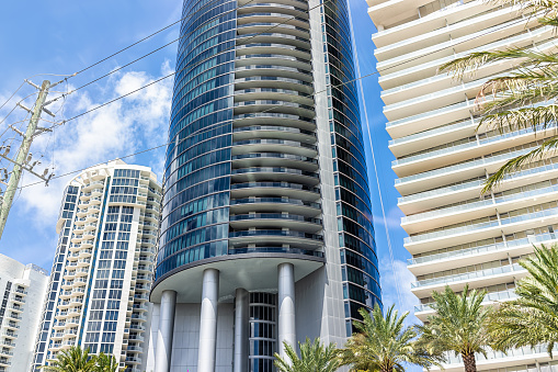 Sunny Isles Beach, USA - July 18, 2021: Modern building in North Miami, Florida with luxury hotel apartment condo building for Porsche Design modern architecture exterior