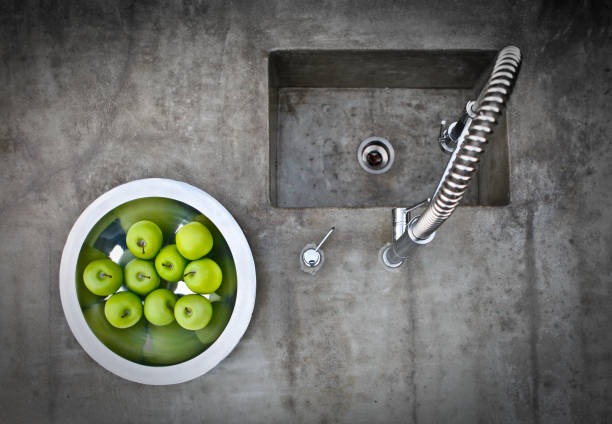 Modern concrete sink still life of a modernist sink. concrete countertops stock pictures, royalty-free photos & images