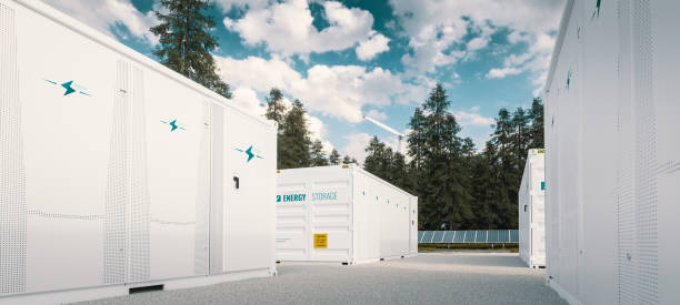modern containerbatterij groene energieopslagsysteem dat met zonnepanelen en windturbine wordt begeleid die in aard 3d teruggeven wordt gesitueerd. - zonnepanelen warehouse stockfoto's en -beelden