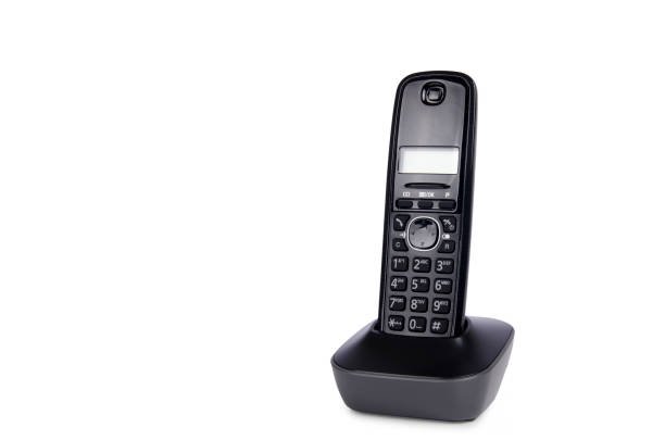 modern cordless dect phone with charging station - mobile phone imagens e fotografias de stock