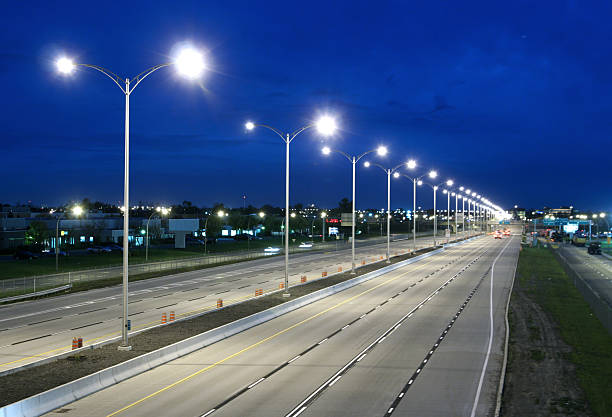 Modern deserted Highway at Night  buzbuzzer stock pictures, royalty-free photos & images